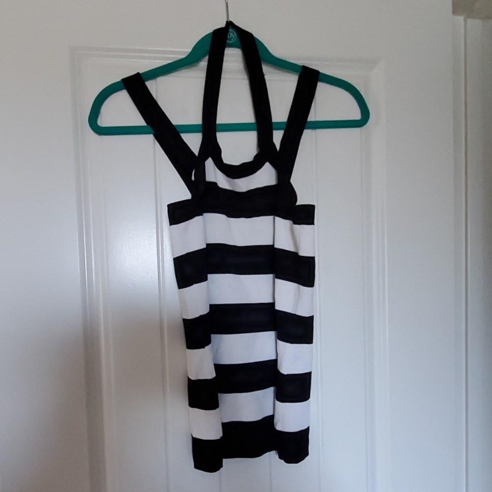 Darling, halter. This halter top was barely worn.